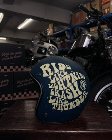 Motorcycle helmet with text in a garage setting