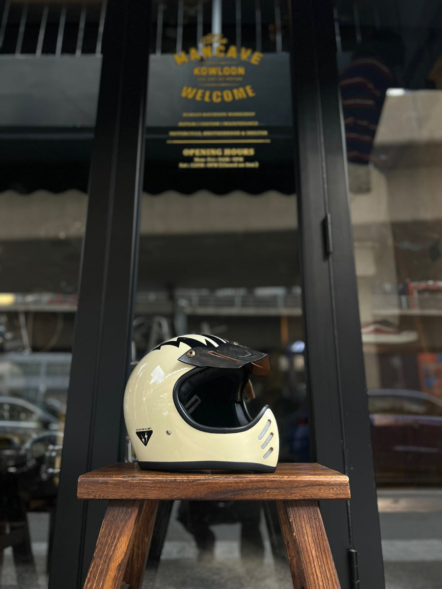 White helmet on a wooden stool with a blurred background