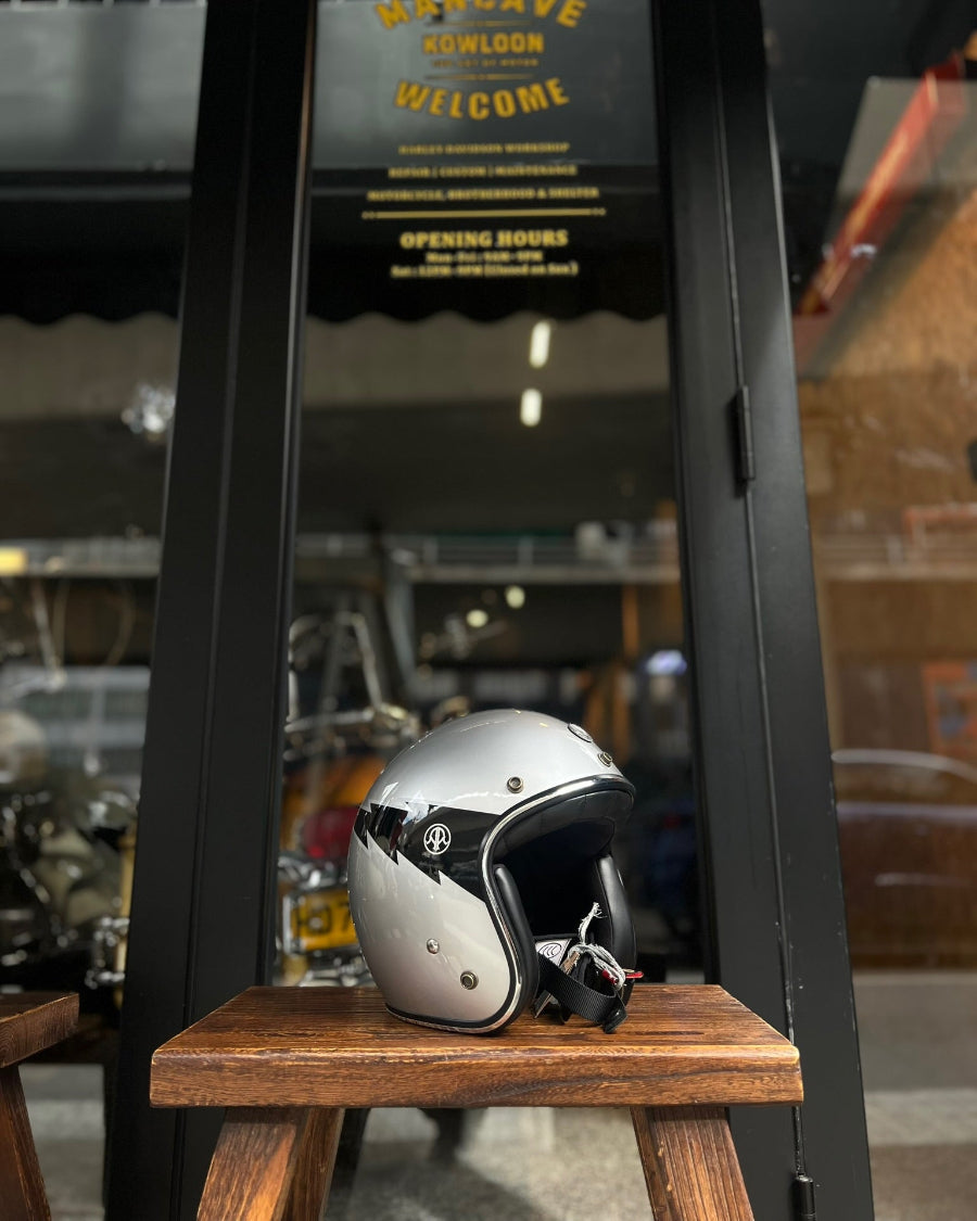 Helmet on a wooden stool with a blurred background of a bar or pub.