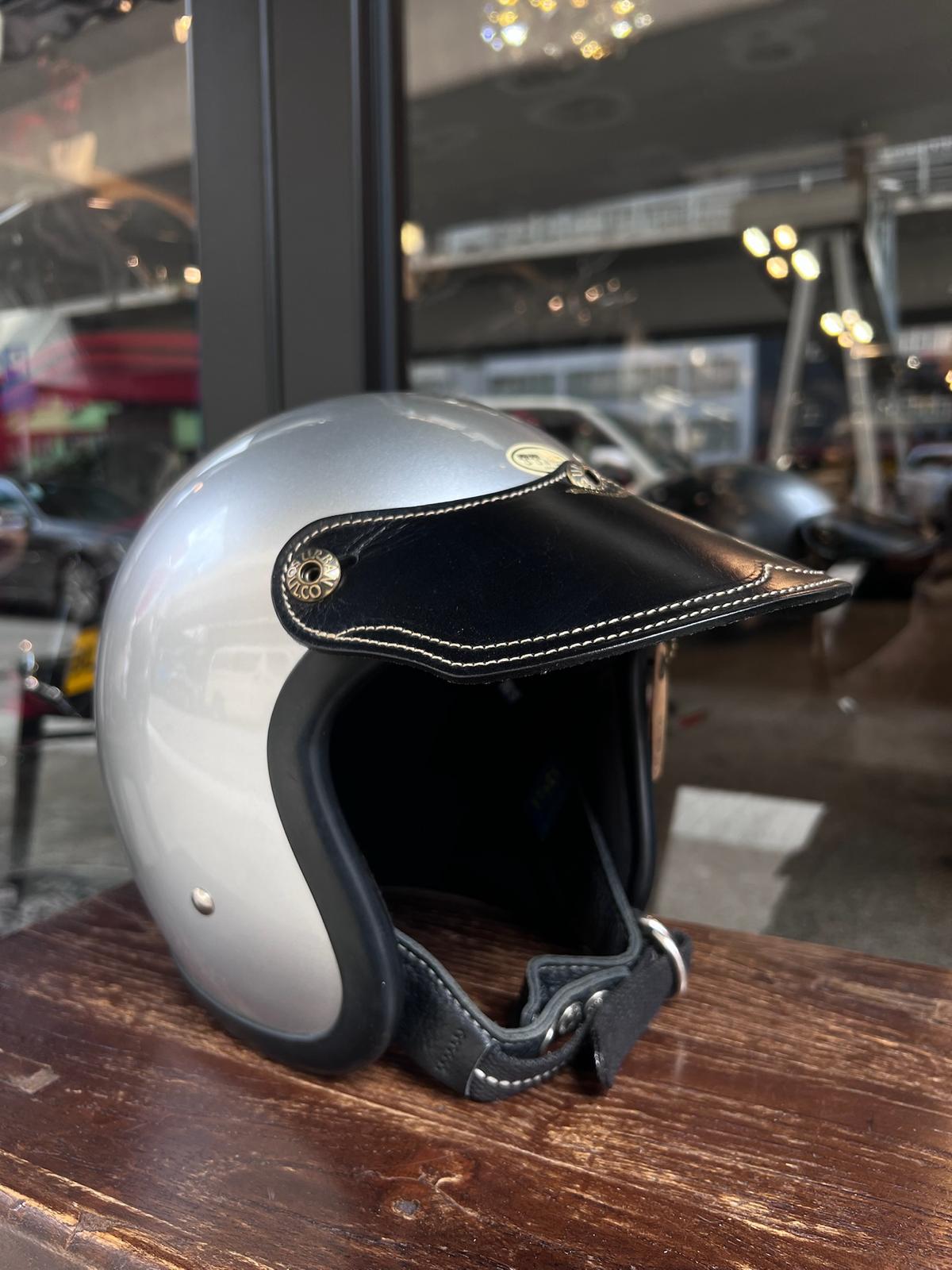 Taiwan brand Air Runner helmet and Urban Soul leather visor display in The Mancave Kowloon Harley Davidson motorcycles repair shop
